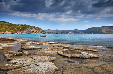 Incredibly romantic sunrise on Nuevo Loca Beach. Traveling concept background. Palaia Fokaia location in the morning light. Greece, Europe. Sunny morning seascape. Spring on the Greek coast Aegean sea