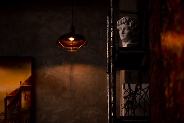 Fototapeta na wymiar Warm light and sculpture in the coffee shop