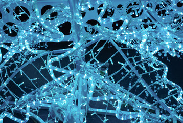 LED lamps in blue tones as Christmas decorations or science concept