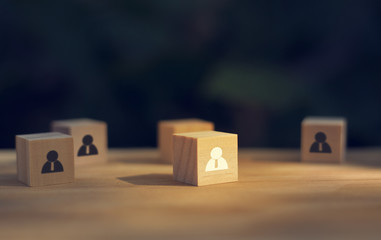 Wooden cube blocks with people icon. business Leadership concept, Select team leader, staff,...