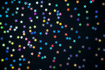 colorful stars on a black background