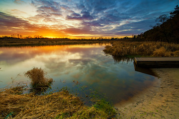Beautiful sunrise over river banks