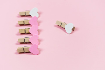 Many of pink hearts on pink paper background for valentines day