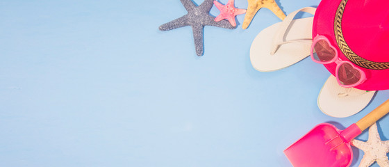 beach accessories on blue board