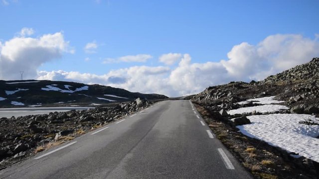 National tourist snow road Aurlandsvegen (f243) running across the mountains. Norway.