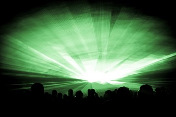 Green laser show nightlife club stage with party people crowd. Luxury entertainment with audience...