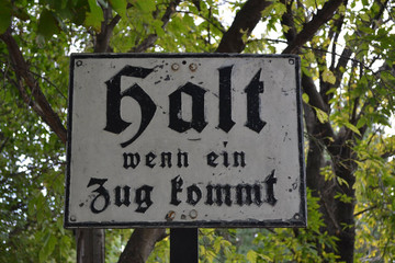 Fototapeta premium a stop sign to trains in german