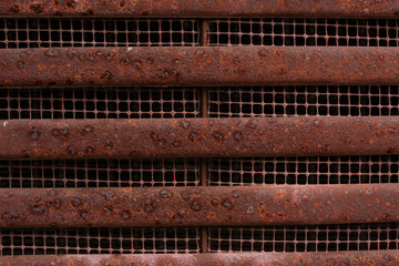close-up rust on surface of old steel grating 