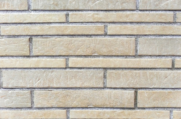 Decorative finishing stone. Texture of a rough stone wall. Background of natural stone.