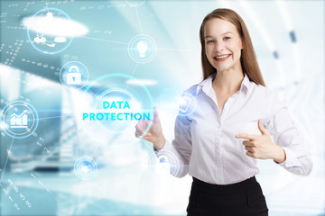 Business, Technology, Internet and network concept. Young businessman working on a virtual screen of the future and sees the inscription: Data protection