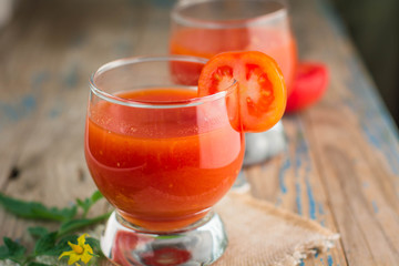 two glasses of freshly squeezed tomato juice