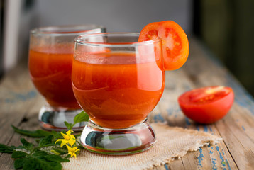 two glasses of freshly squeezed tomato juice