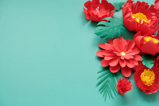 Hello, Spring. With Red Paper Flowers And Green Leaves