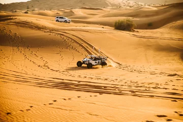 Foto op Canvas White buggy in the desert © Razoran