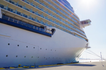 Modern luxury cruise ship or cruiseship liner in port of Piraeus in Athens in Greece with other...