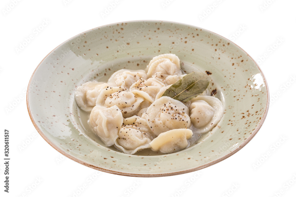 Wall mural russian meat dumplings pelmeni on grey plate isolated on white background