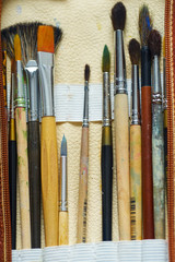 Painter's brushes professional case. Close up.