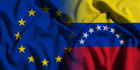 National flag of Venezuela with European Union (EU) flag on a waving cotton texture background