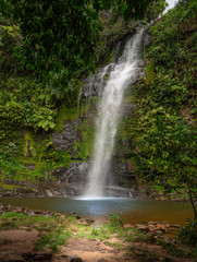 Fototapeta na wymiar Beautiful waterfall with trees around
