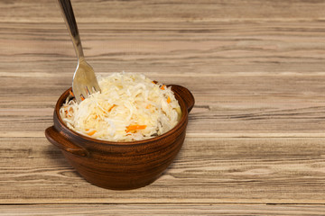 Sauerkraut in a bowl. The trendy trend is fermented vegetarian food.