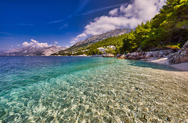 Amazing seascape of Adriatic sea.  Colorful summer view of small Brela beach Croatia, Europe....