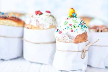 Easter cakes on a white wooden background