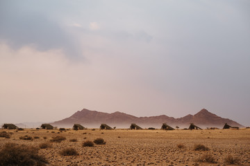 small chalets of desert lodge at Namib-Naukluft National Park