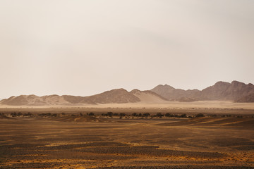 Naklejka premium mountains in morning before sunrise at namib desert Namibia
