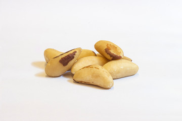 Fototapeta na wymiar Brazilian Nuts Frame. Castanha do Para isolated on white background