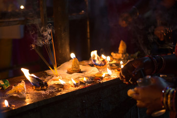 Candles close-up in the Indian Temple on a Religious Festival Diwali. Oil Lamp