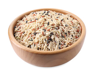 Mix of different brown rice in wooden bowl isolated on white
