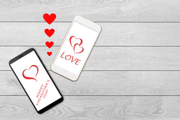 Valentine day concept, love message - hearts flying out smartphone, Isolated on white wooden background
