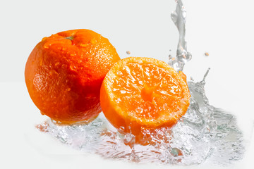 wet fresh juicy mandarin with water splashes