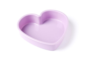 silicone mold for baking on a white background. Culinary accessories of the baker. Small baking cups. It is isolated.