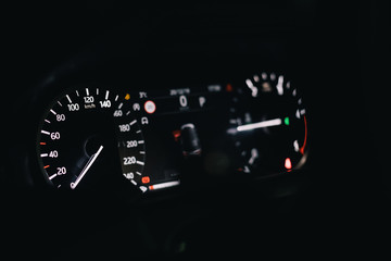close-up. tachometer speedometer and virtual dashboard of a premium car cockpit
