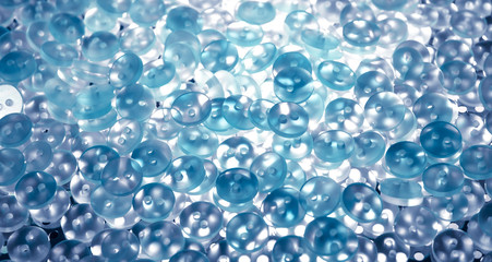 blue pearl plastic buttons background