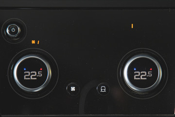 Conditioner climate control in a modern car. Buttons
