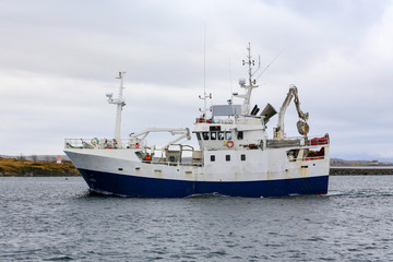 Fishing boat through Br&oslash;nn&oslash;ysundet, Nordland county
