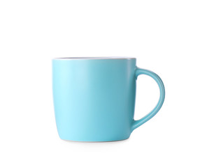 Beautiful light blue cup isolated on white