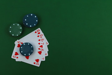 Playing cards and poker chips.