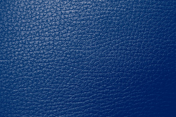 The texture of genuine leather is blue tone. Backdrop background for design. Faux eco leather...