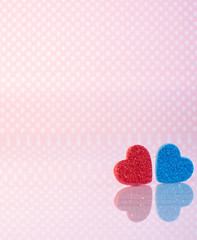 Valentines background. Red and blue Heart on table with reflection on it.  Valentine day love concept. Lovely photo.