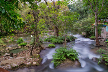 Obraz premium river flowing into waterfall ,night photo ,place for rafting, Panoramic beautiful deep forest waterfall ,Nature Los Micos, National Park in San Luis Potosi, Mexico