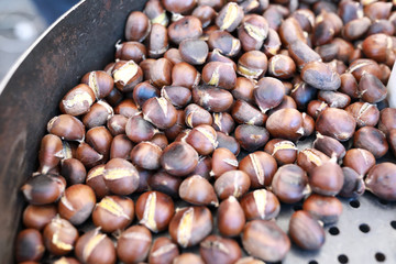 Roasting chestnuts in frying pan