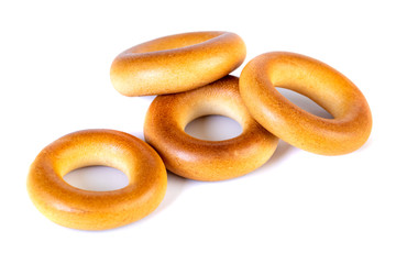 Small dry bagels, small rolls on a white background