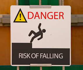 Road sign warning of danger through risk of falling