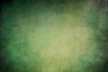  green abstract background on canvas texture