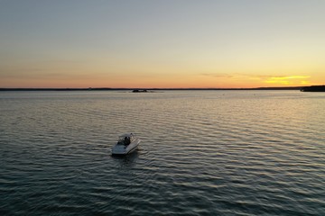  Sunset over the lake in nature on a sunny summer evening