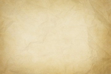 old crumpled paper texture or background with dark vignette borders