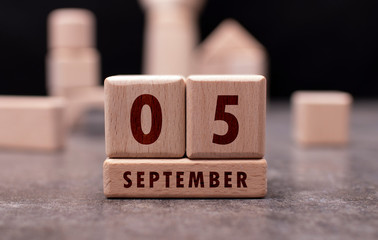 September 5 written with wooden blocks